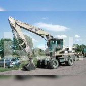 Экскаватор с грейфером Caterpillar M318 Экскаватор с грейфером Caterpillar M318